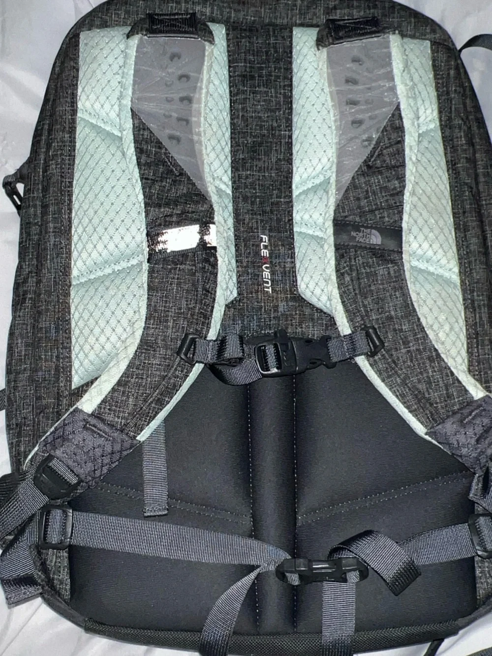 The North Face Black Backpack with Light Gray-Green Accents